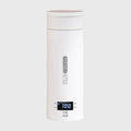 Chauffe-biberon électrique portable en acier inoxydable blanc avec écran LED affichant la température – format thermos de voyage pour bébé