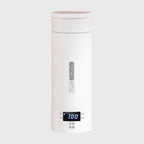 Chauffe-biberon électrique portable en acier inoxydable blanc avec écran LED affichant la température – format thermos de voyage pour bébé